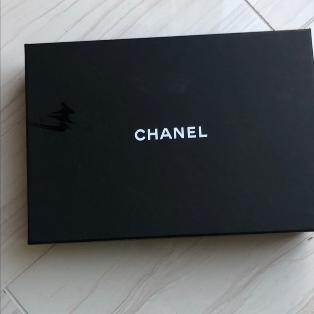 Chanel Authentic WOC lamb skin
